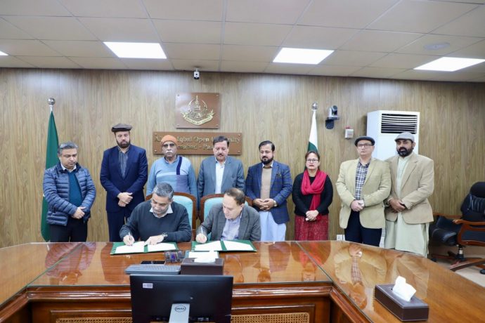 Allama Iqbal Open University and the Forum for Language Initiatives sign a MoU.